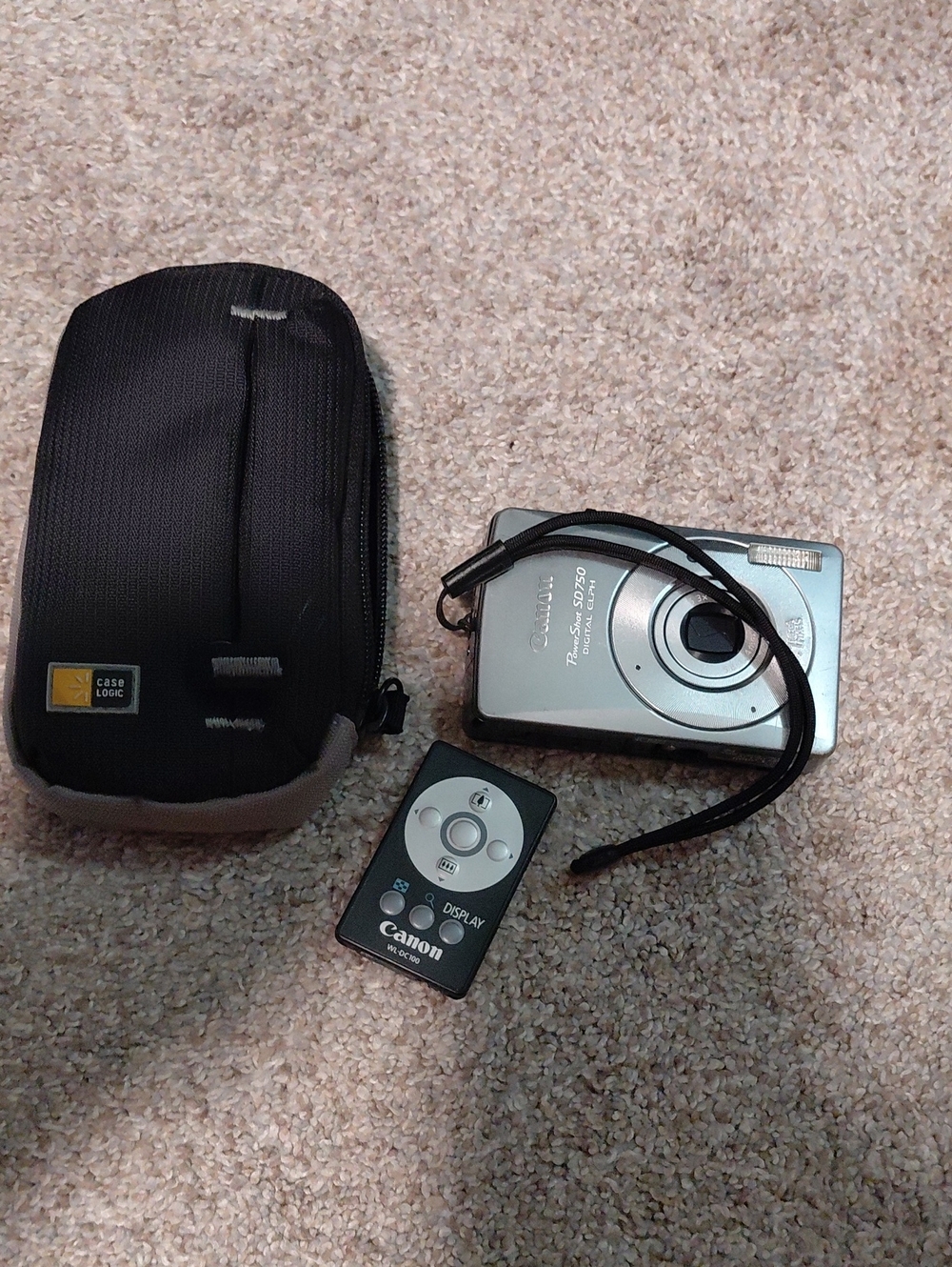 Canon Silver Compact Digital Camera with Black Case and Remote